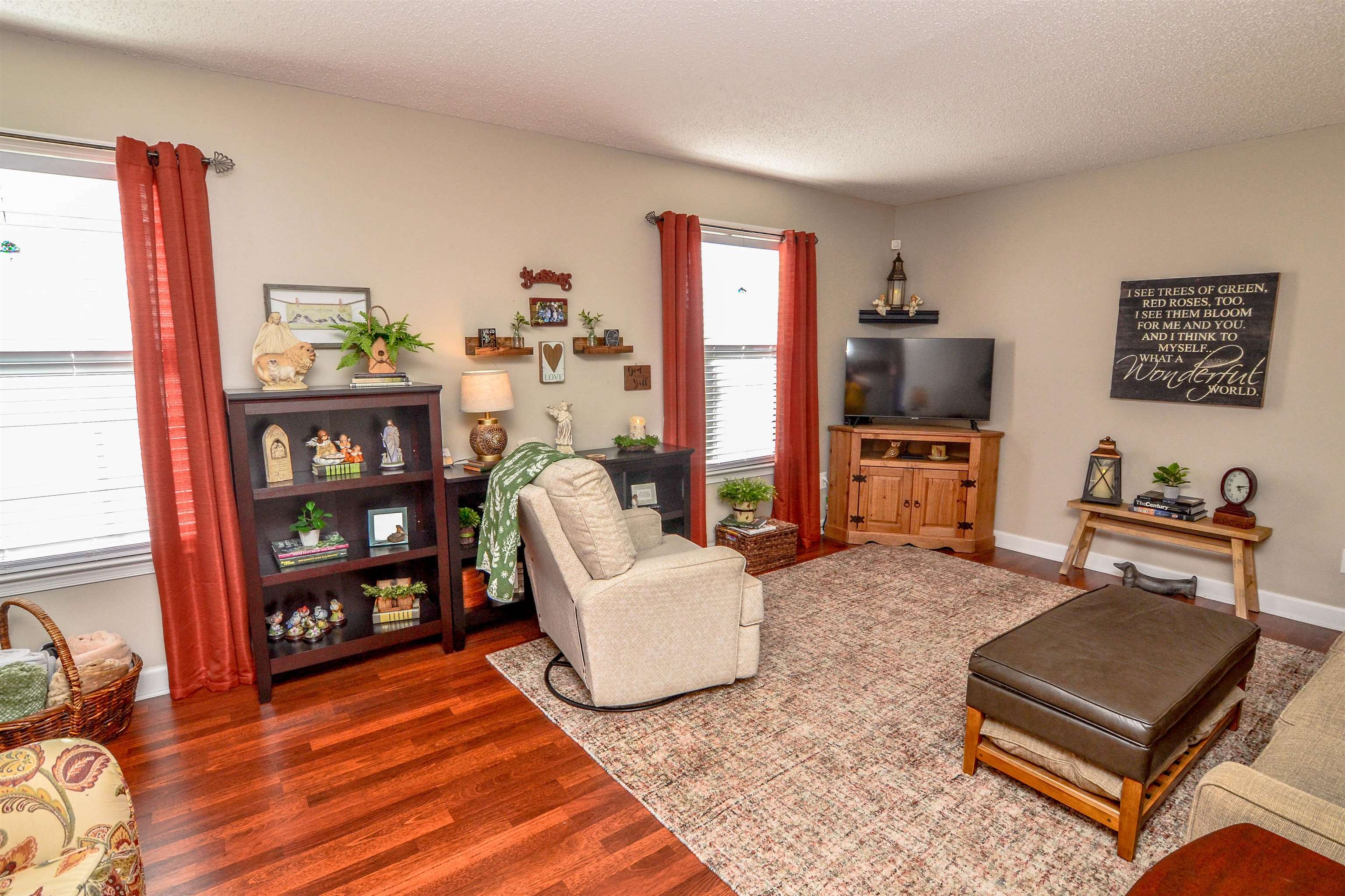 5676 Quince Road, Unit 11 Memphis, TN 38119 - Photo 6 of 22 a living room with furniture and a flat screen tv