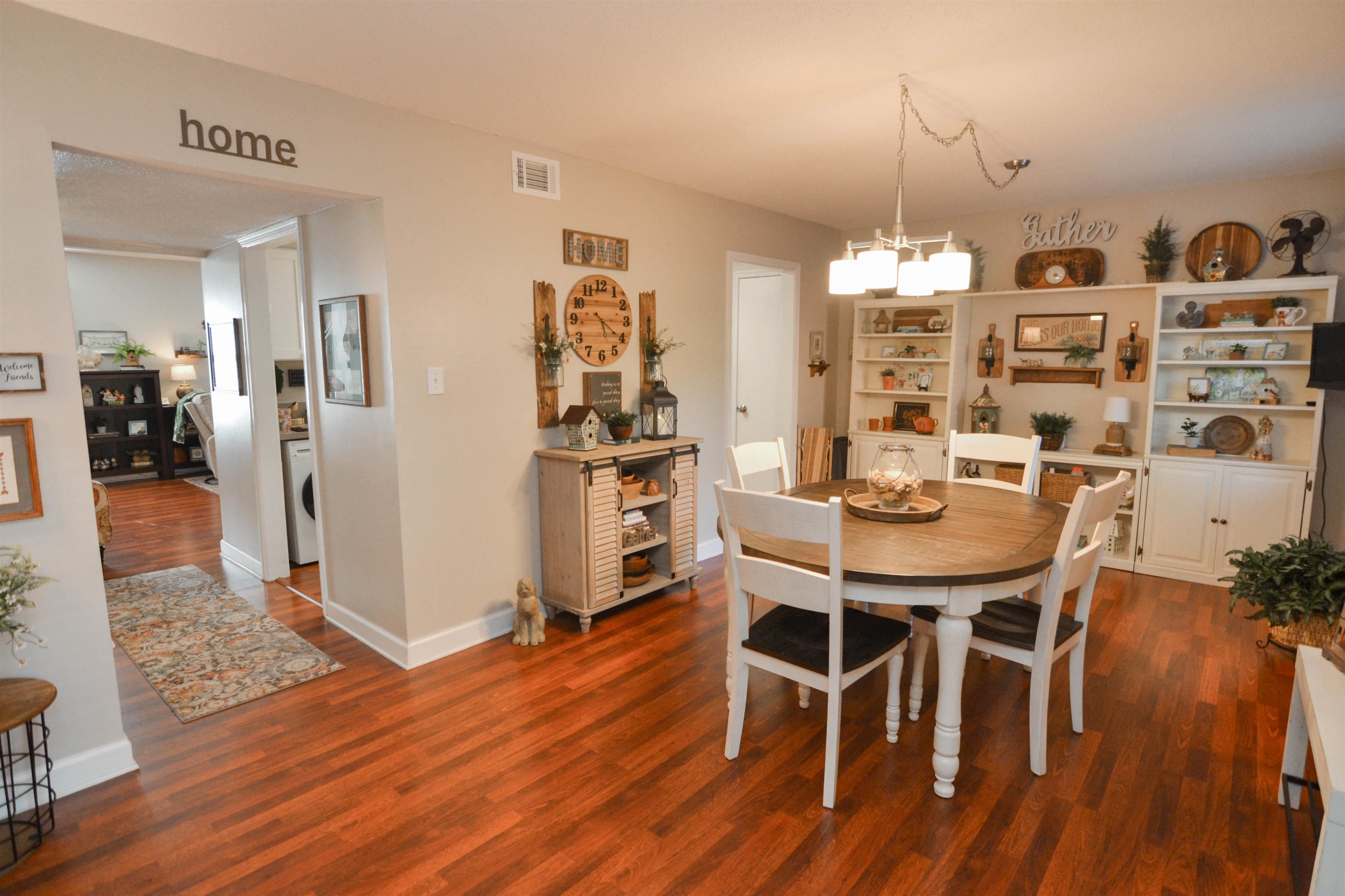 5676 Quince Road, Unit 11 Memphis, TN 38119 - Photo 8 of 22 a dining room with furniture and wooden floor