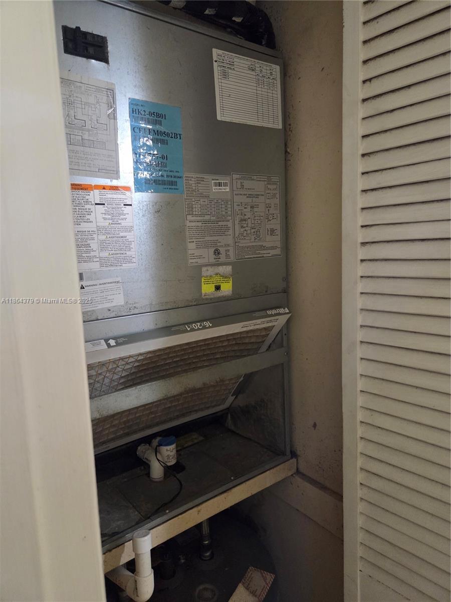 14165 Southwest 87th Street, Unit D103 Miami, FL 33183 - Photo 12 of 41 a close view of utility room