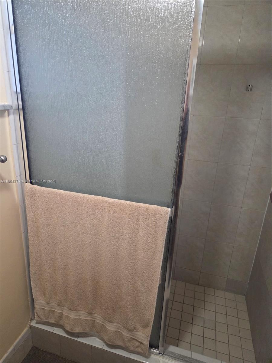 14165 Southwest 87th Street, Unit D103 Miami, FL 33183 - Photo 17 of 41 view of a door