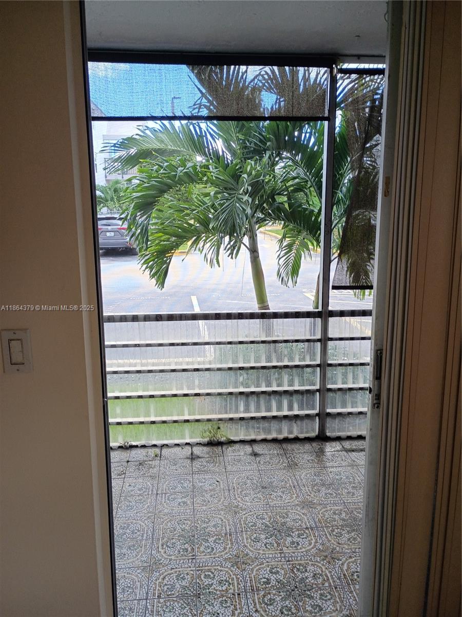 14165 Southwest 87th Street, Unit D103 Miami, FL 33183 - Photo 25 of 41 a view of a window in a room