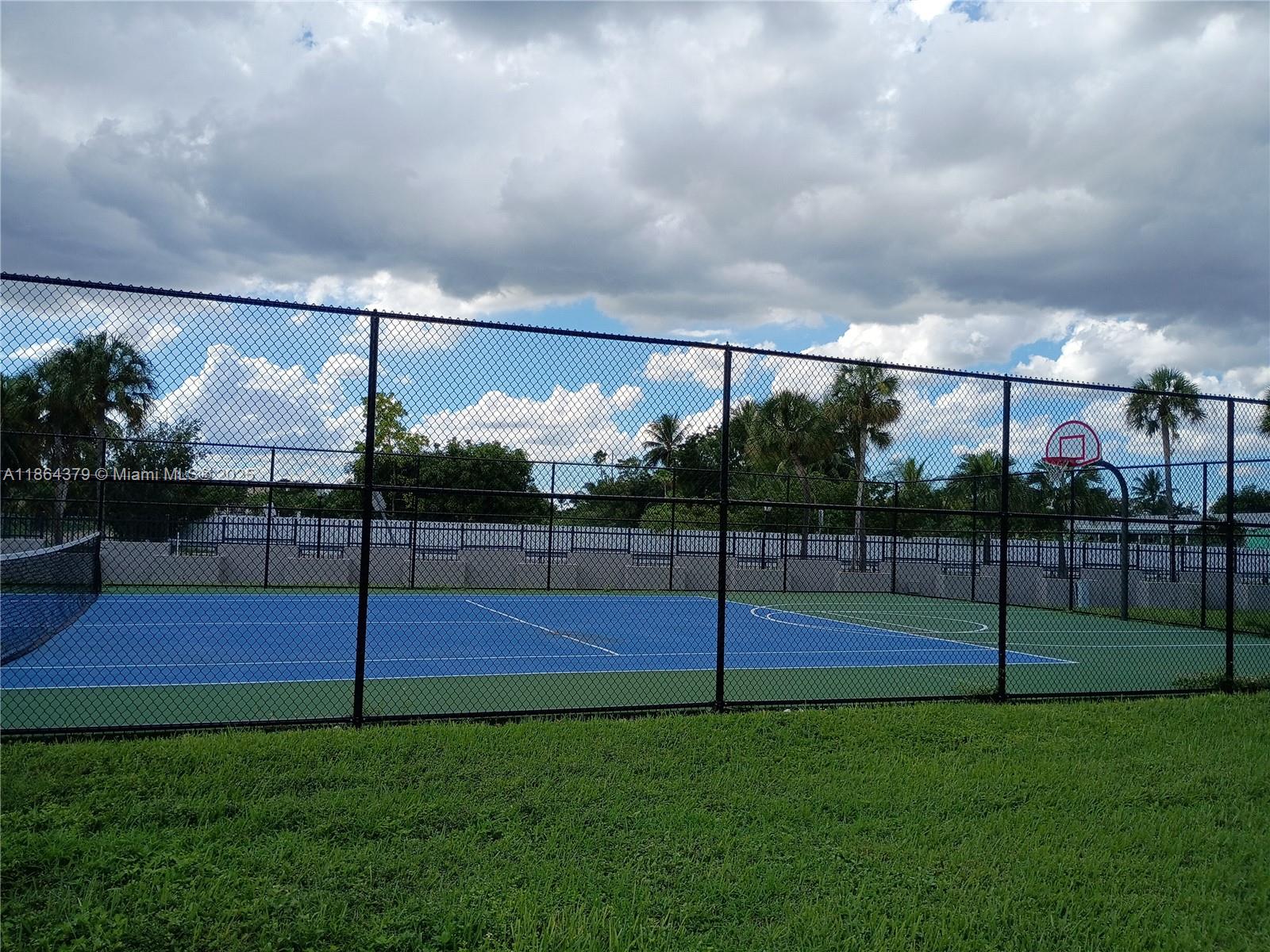 14165 Southwest 87th Street, Unit D103 Miami, FL 33183 - Photo 9 of 41 a view of a park