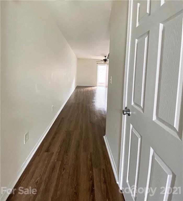 750 Elders Story Road Fort Mill, SC 29708 - Photo 2 of 24 a view of a hallway with wooden floor and staircase