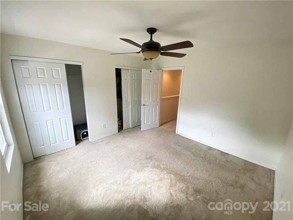 750 Elders Story Road Fort Mill, SC 29708 - Photo 14 of 24 a view of a livingroom with a chandelier fan and wooden floor