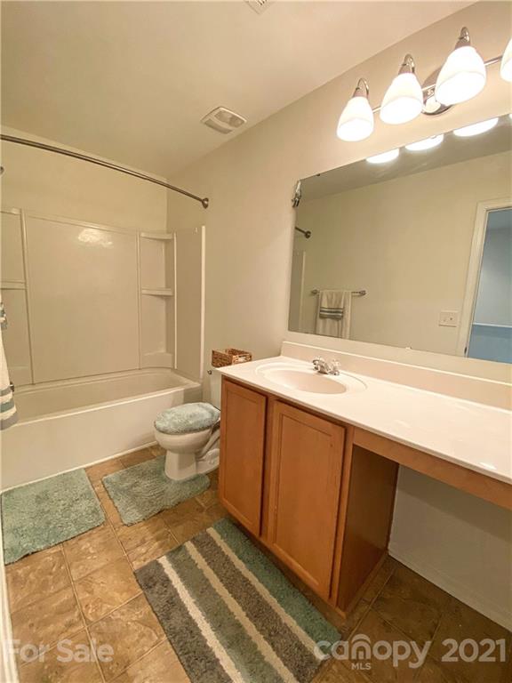 750 Elders Story Road Fort Mill, SC 29708 - Photo 19 of 24 a spacious bathroom with a sink a toilet and a shower