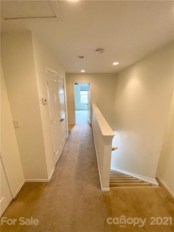 750 Elders Story Road Fort Mill, SC 29708 - Photo 21 of 24 a view of a hallway with wooden floor