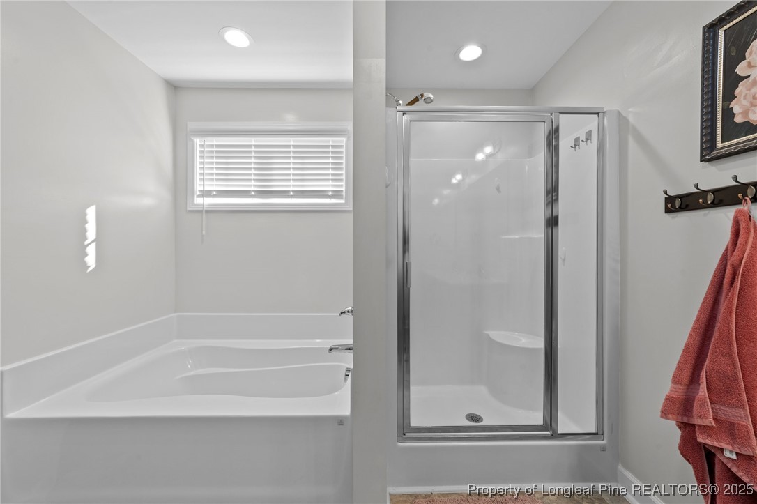 264 Mill Ridge Court Godwin, NC 28344 - Photo 21 of 43 a bathroom with a shower