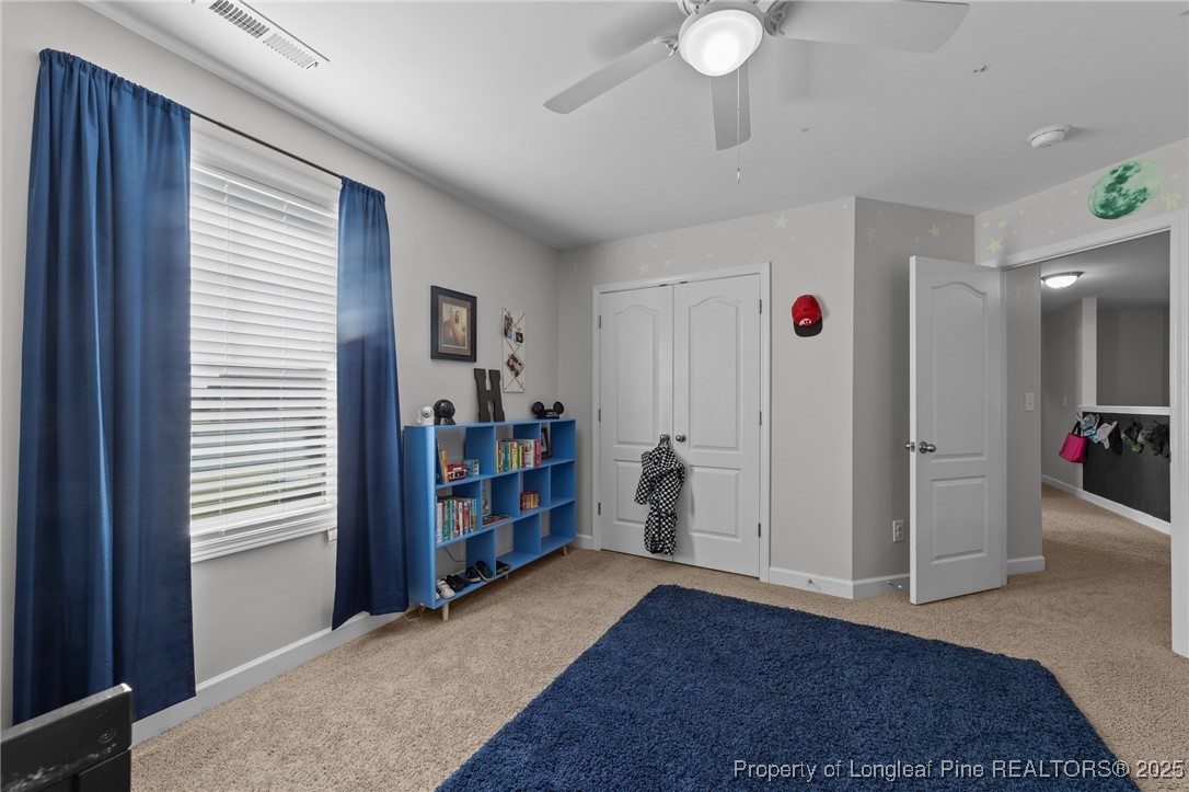 264 Mill Ridge Court Godwin, NC 28344 - Photo 27 of 43 a view of livingroom with furniture and a window