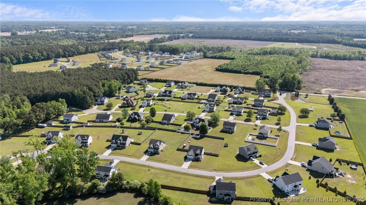 264 Mill Ridge Court Godwin, NC 28344 - Photo 37 of 43 an aerial view of residential houses with outdoor space