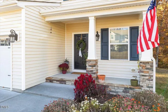 a front view of a house with a garage