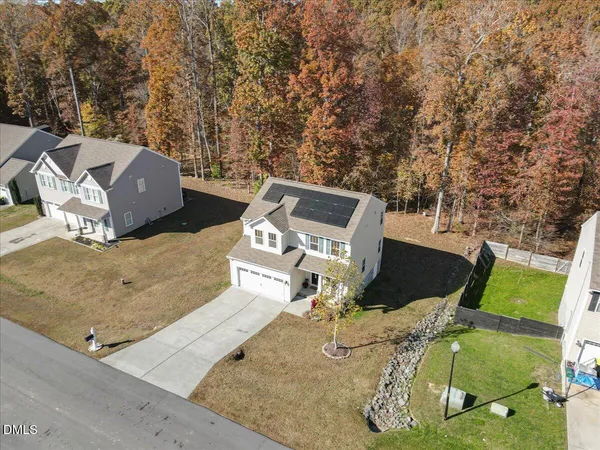 swimming pool view with a seating space