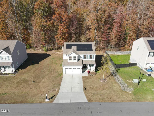swimming pool view with a sitting space