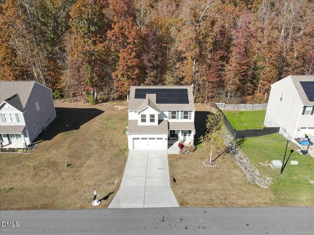 swimming pool view with a sitting space