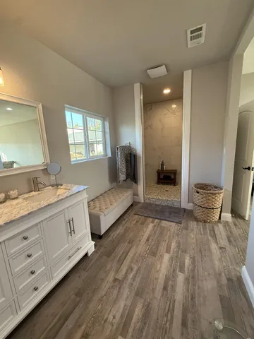 a bathroom with a sink and toilet