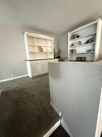 a view of a hallway with window