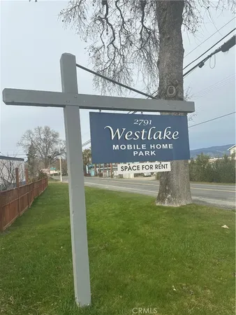 a view of outdoor space with sign board