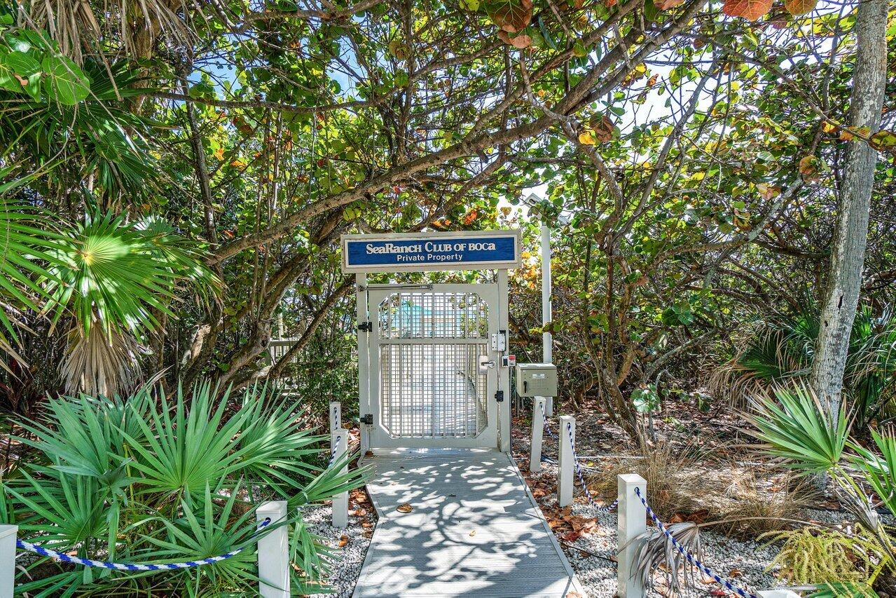 4201 North Ocean Boulevard, Unit 1801 Boca Raton, FL 33431 - Photo 47 of 48 a sign board with tall trees