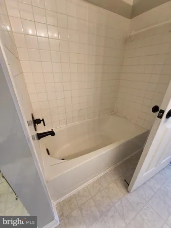 a bathroom with a bathtub