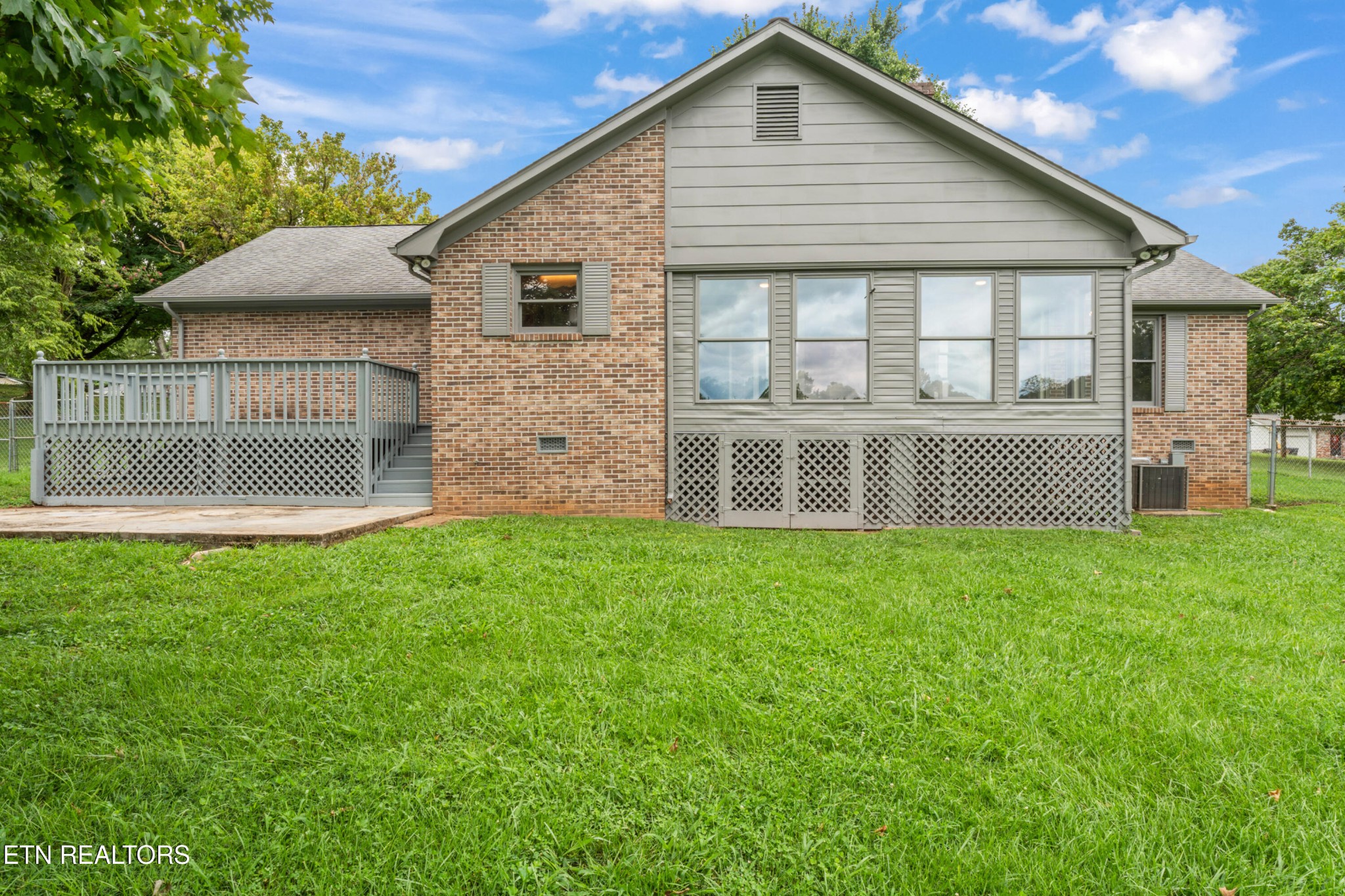 4028 Sullivan Road Knoxville, TN 37921 - Photo 41 of 47 a view of a house with a backyard