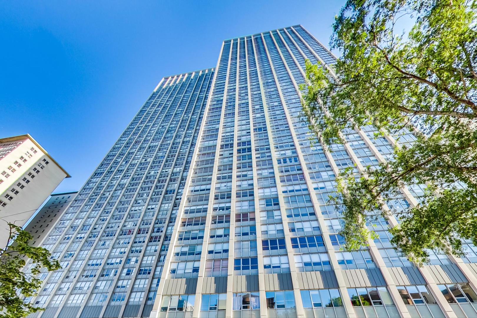 655 West Irving Park Road, Unit 5405 Chicago, IL 60613 - Photo 1 of 31 front view of a building