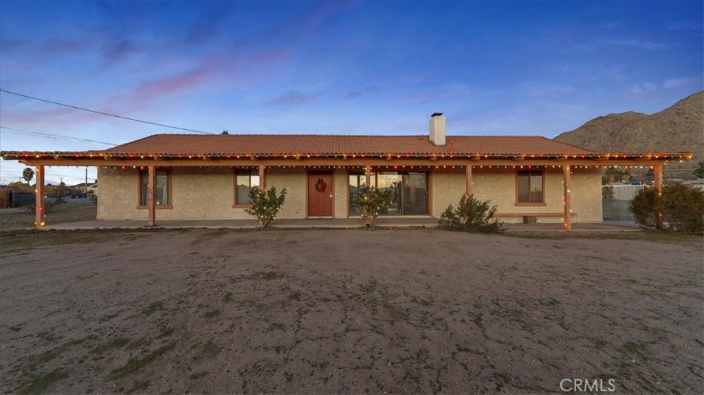 16043 St Timothy Road Apple Valley, CA 92307 - Photo 1 of 48 a view of a house with a yard
