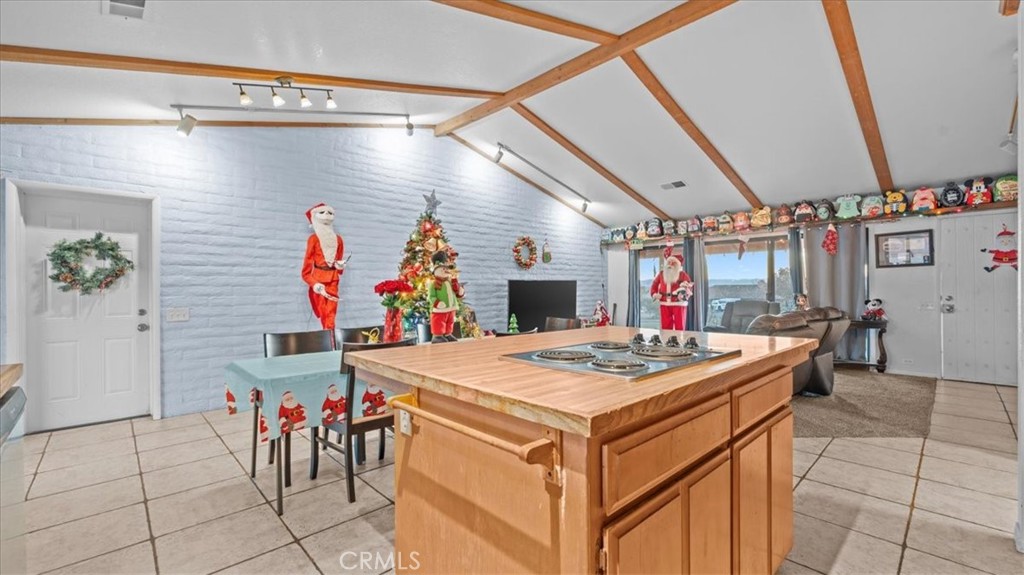 16043 St Timothy Road Apple Valley, CA 92307 - Photo 16 of 48 a group of people sitting in a room