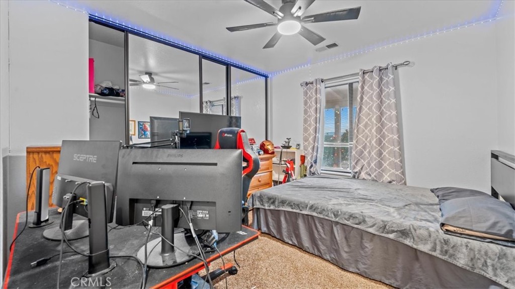 16043 St Timothy Road Apple Valley, CA 92307 - Photo 23 of 48 a very nice looking room with a large window