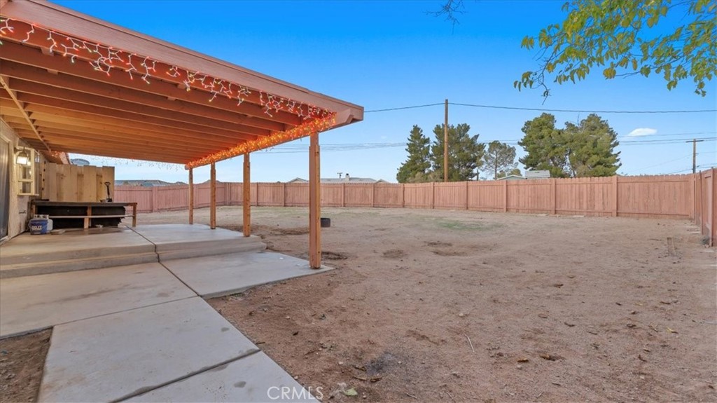 16043 St Timothy Road Apple Valley, CA 92307 - Photo 27 of 48 a view of a backyard