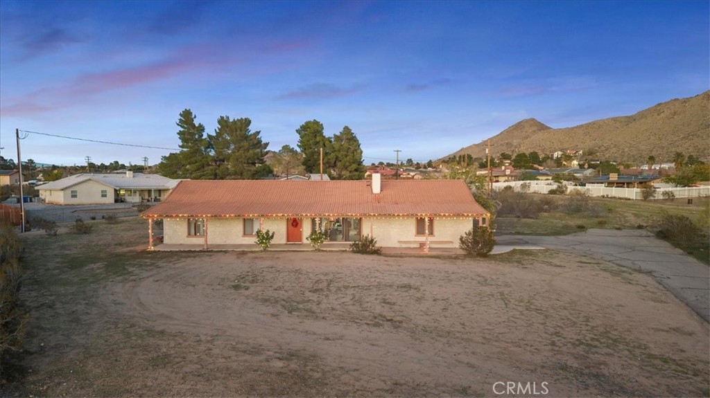 16043 St Timothy Road Apple Valley, CA 92307 - Photo 36 of 48 a view of a road with an ocean and a houses