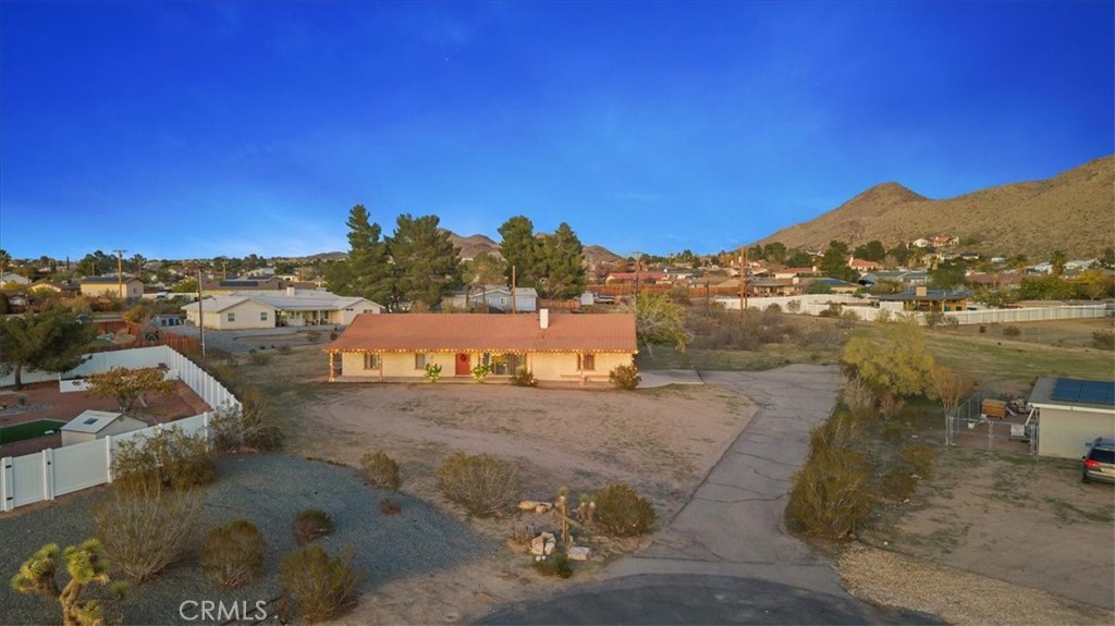 16043 St Timothy Road Apple Valley, CA 92307 - Photo 37 of 48 a view of a town with mountains in the background