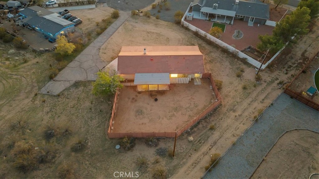 16043 St Timothy Road Apple Valley, CA 92307 - Photo 39 of 48 an aerial view of a house with a yard