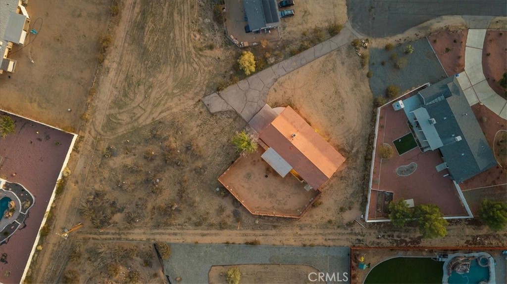 16043 St Timothy Road Apple Valley, CA 92307 - Photo 40 of 48 an aerial view of a house with a yard