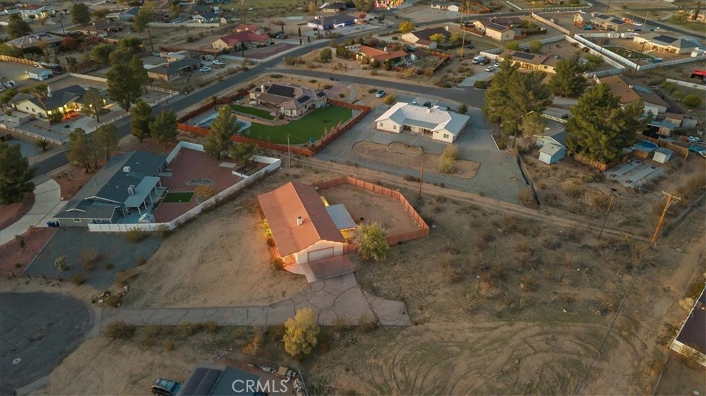 16043 St Timothy Road Apple Valley, CA 92307 - Photo 41 of 48 an aerial view of a house with a yard