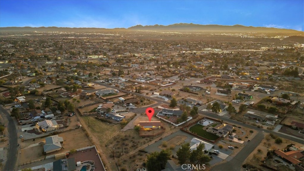 16043 St Timothy Road Apple Valley, CA 92307 - Photo 44 of 48 an aerial view of residential houses with outdoor space