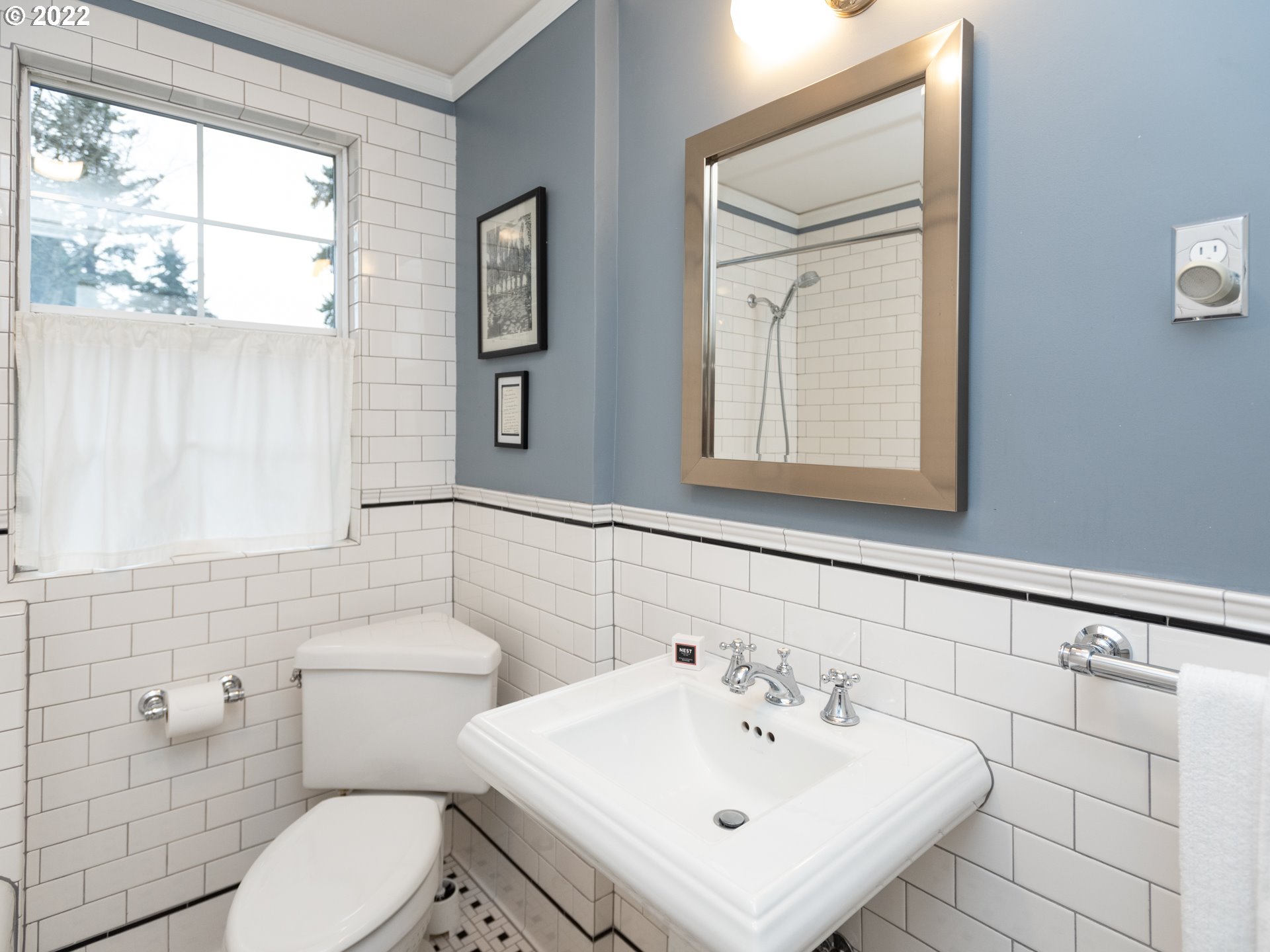 2711 Southwest Patton Road Portland, OR 97201 - Photo 19 of 32 a bathroom with a sink mirror and toilet