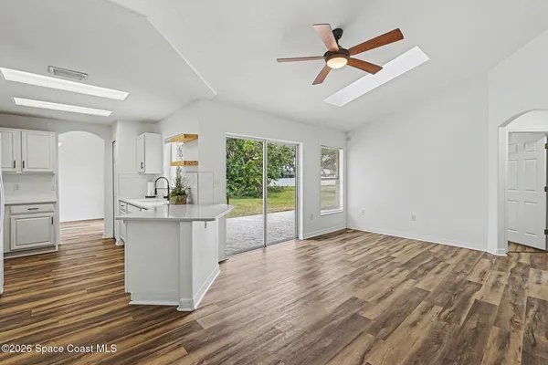 a bathroom with a sink a mirror and a bathtub