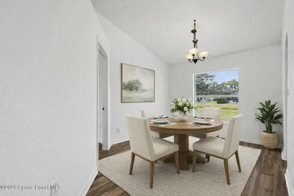 a kitchen with cabinets a sink and appliances