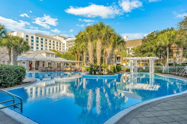 a view of a swimming pool with a patio