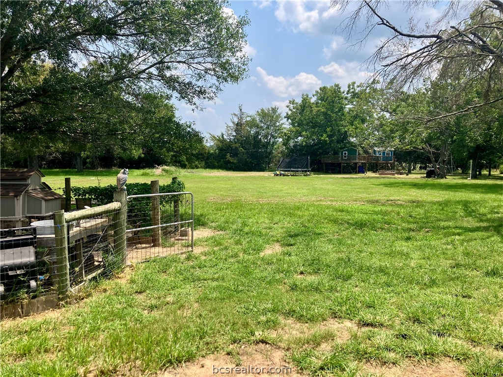 5660 Falling Water Bryan, TX 77808 - Photo 4 of 27 View of yard featuring a rural view