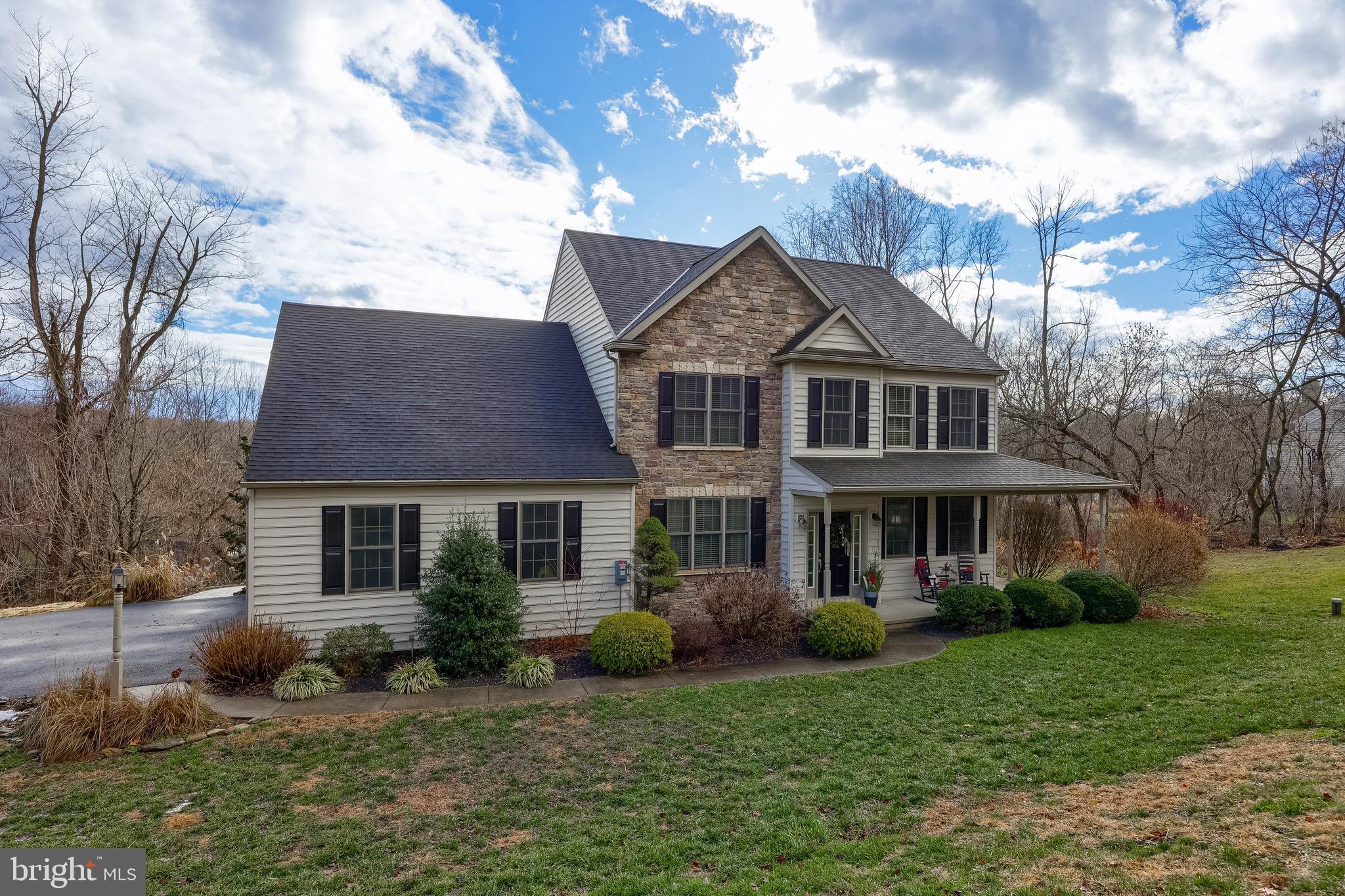 471 Shenks Ferry Road Conestoga, PA 17516 - Photo 13 of 105 a front view of a house with a yard