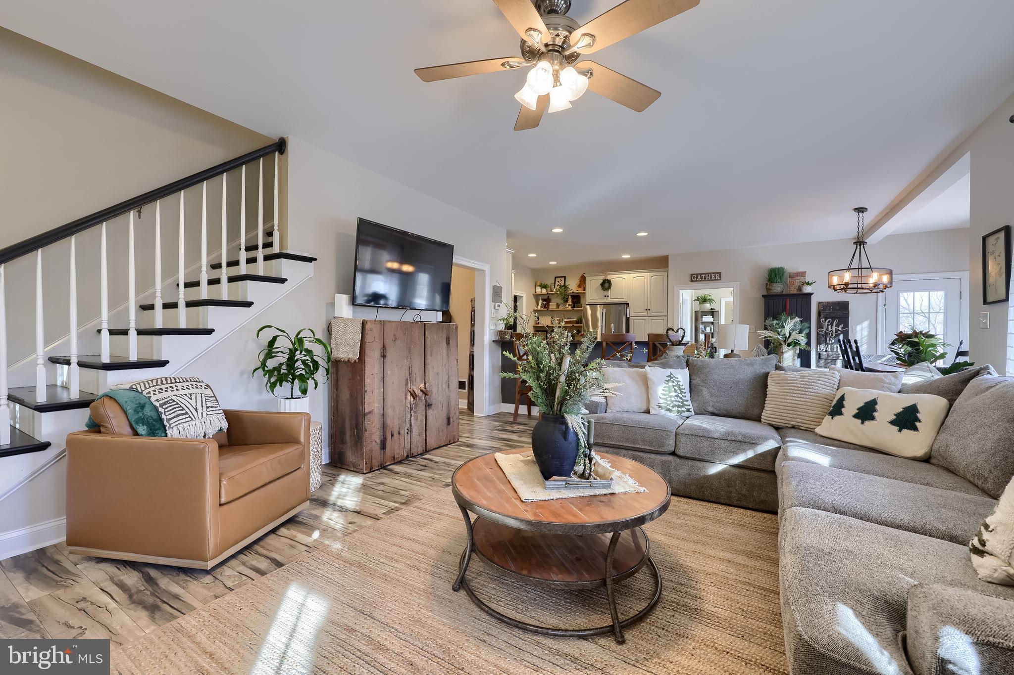 471 Shenks Ferry Road Conestoga, PA 17516 - Photo 20 of 105 a living room with furniture and a wooden floor