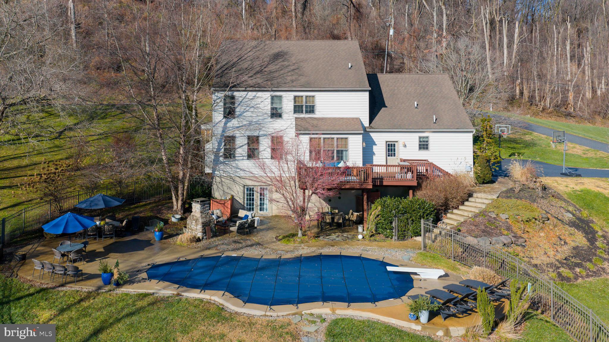 471 Shenks Ferry Road Conestoga, PA 17516 - Photo 3 of 105 an aerial view of a house with swimming pool garden and patio