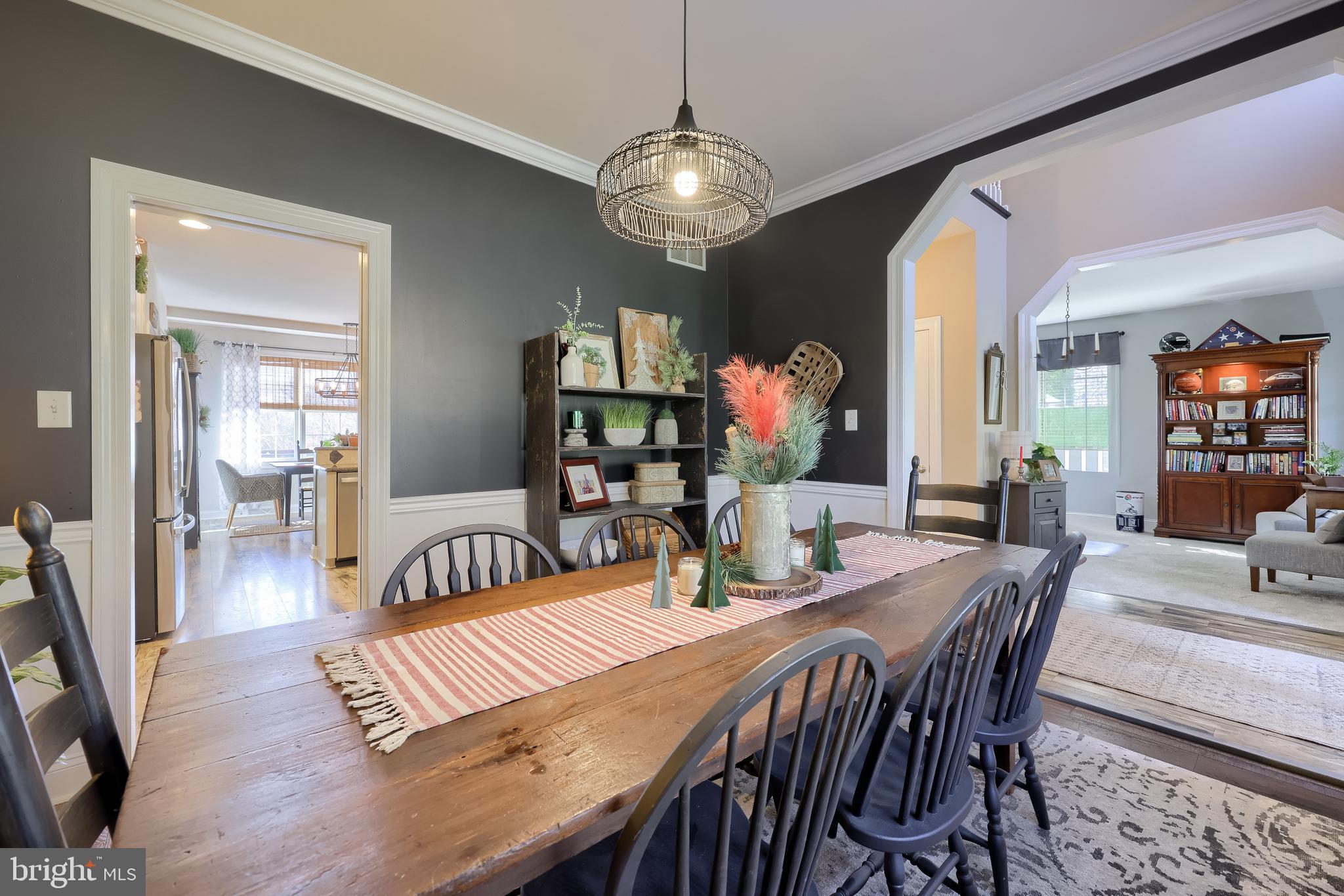 471 Shenks Ferry Road Conestoga, PA 17516 - Photo 33 of 105 a view of a dining room with furniture and wooden floor