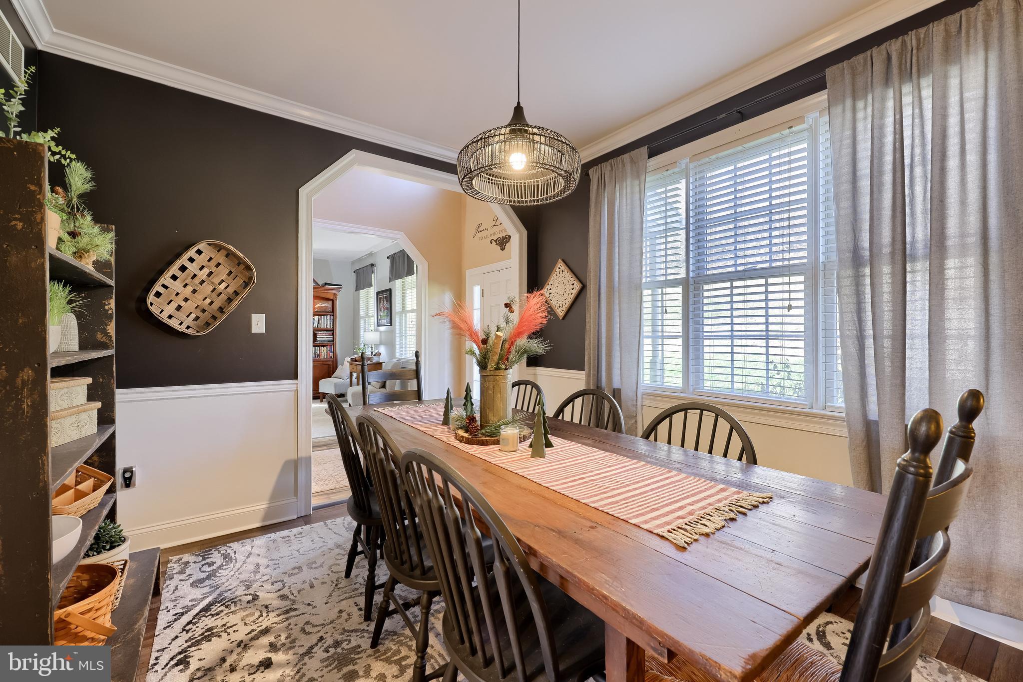 471 Shenks Ferry Road Conestoga, PA 17516 - Photo 36 of 105 a view of a dining room with furniture window and wooden floor