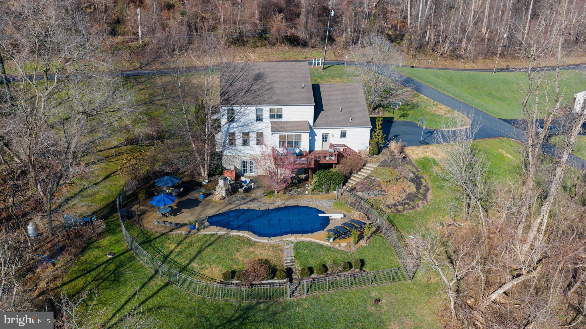 471 Shenks Ferry Road Conestoga, PA 17516 - Photo 4 of 105 an aerial view of a house with a yard and lake view