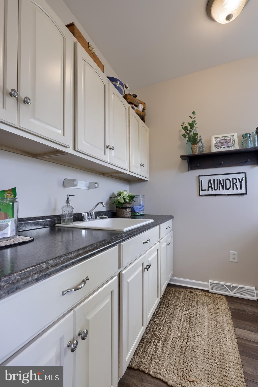 471 Shenks Ferry Road Conestoga, PA 17516 - Photo 44 of 105 a kitchen with granite countertop a sink and cabinets