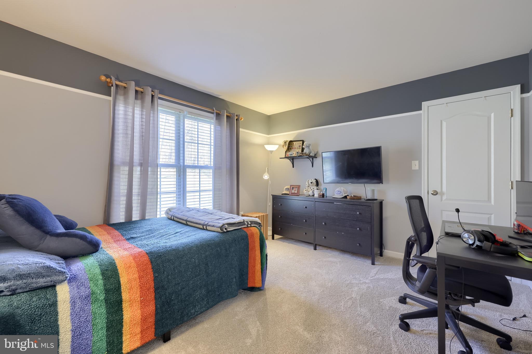 471 Shenks Ferry Road Conestoga, PA 17516 - Photo 55 of 105 a bedroom with a bed and a flat screen tv