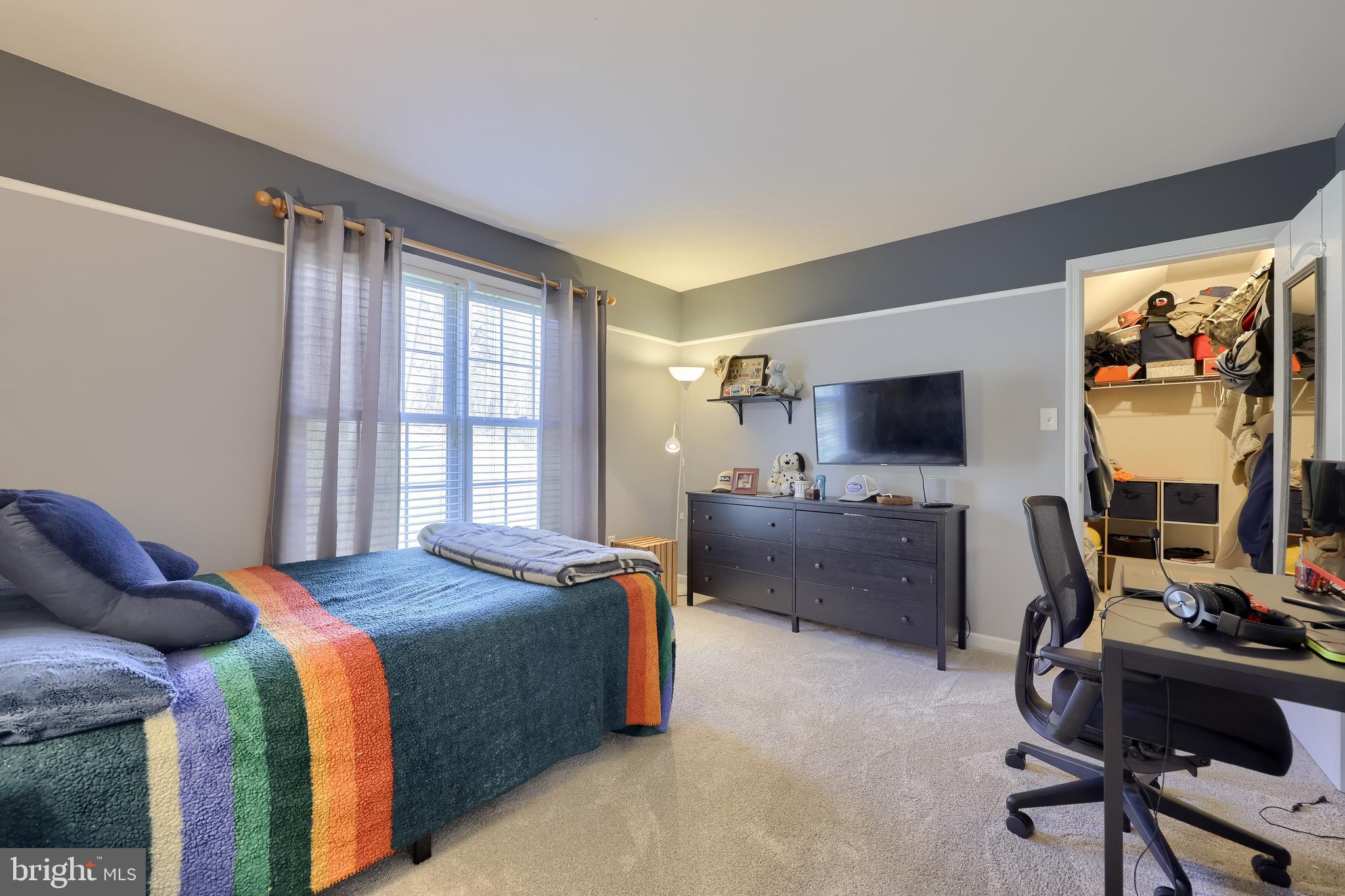 471 Shenks Ferry Road Conestoga, PA 17516 - Photo 56 of 105 a bedroom with a bed and a flat screen tv