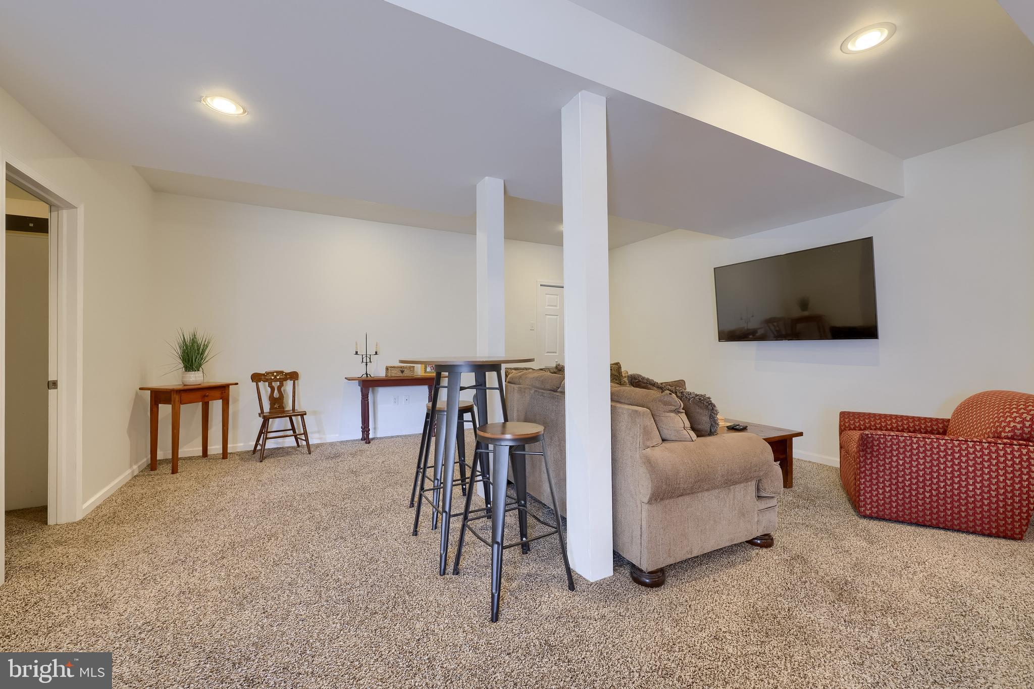 471 Shenks Ferry Road Conestoga, PA 17516 - Photo 64 of 105 a living room with furniture and a flat screen tv