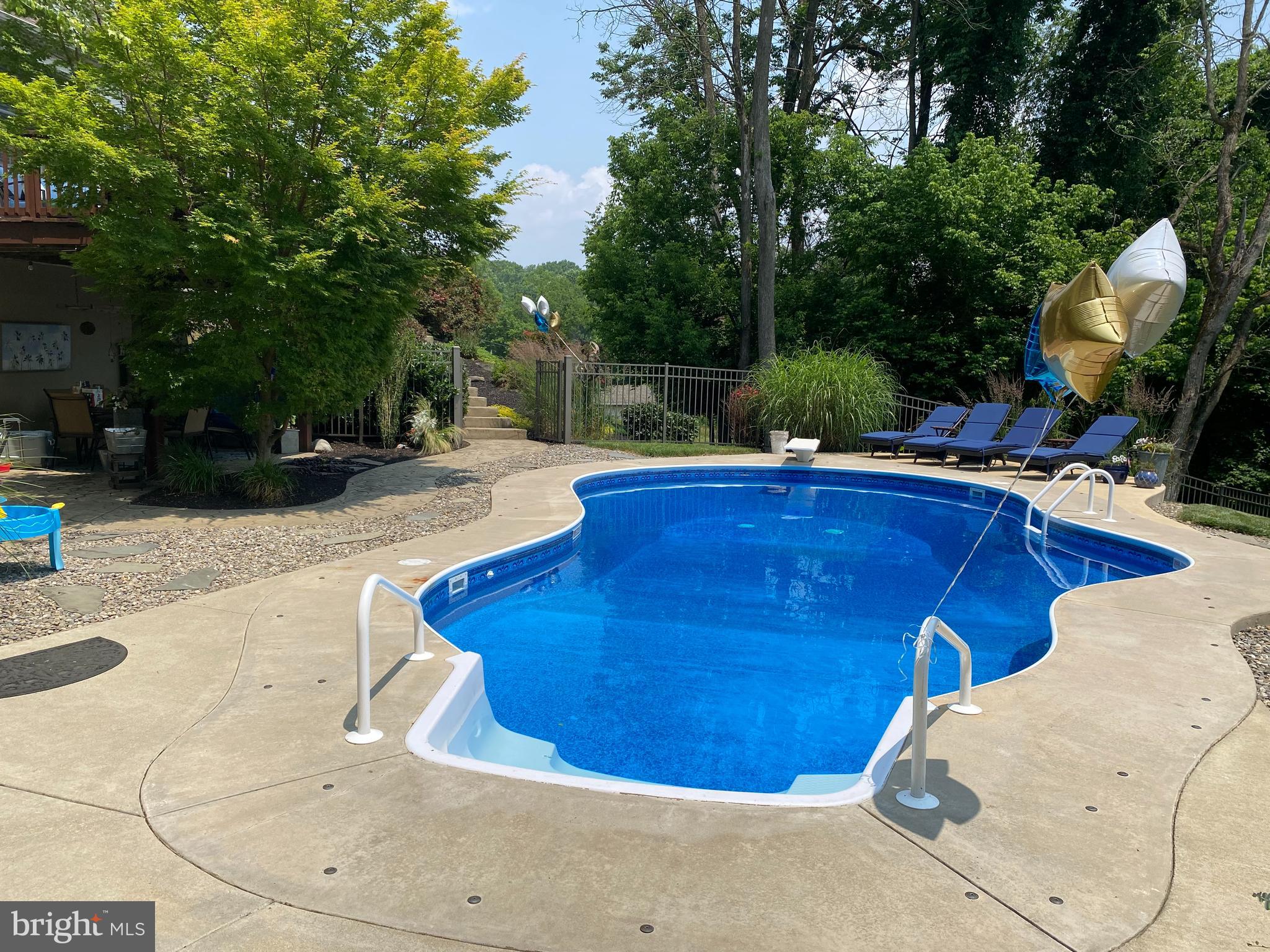 471 Shenks Ferry Road Conestoga, PA 17516 - Photo 7 of 105 a view of a swimming pool in the backyard